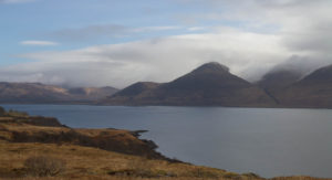 View of loch na keal, mountains on the one side shrouded in cloud
