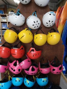 Beyond Adventure, SUP experience. Helmets on the rack