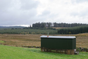 Inage of Creeside Escape in South Ayrshire. A shepherds hut in the field