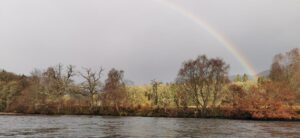 Photo of a rainbow above the river Tummel